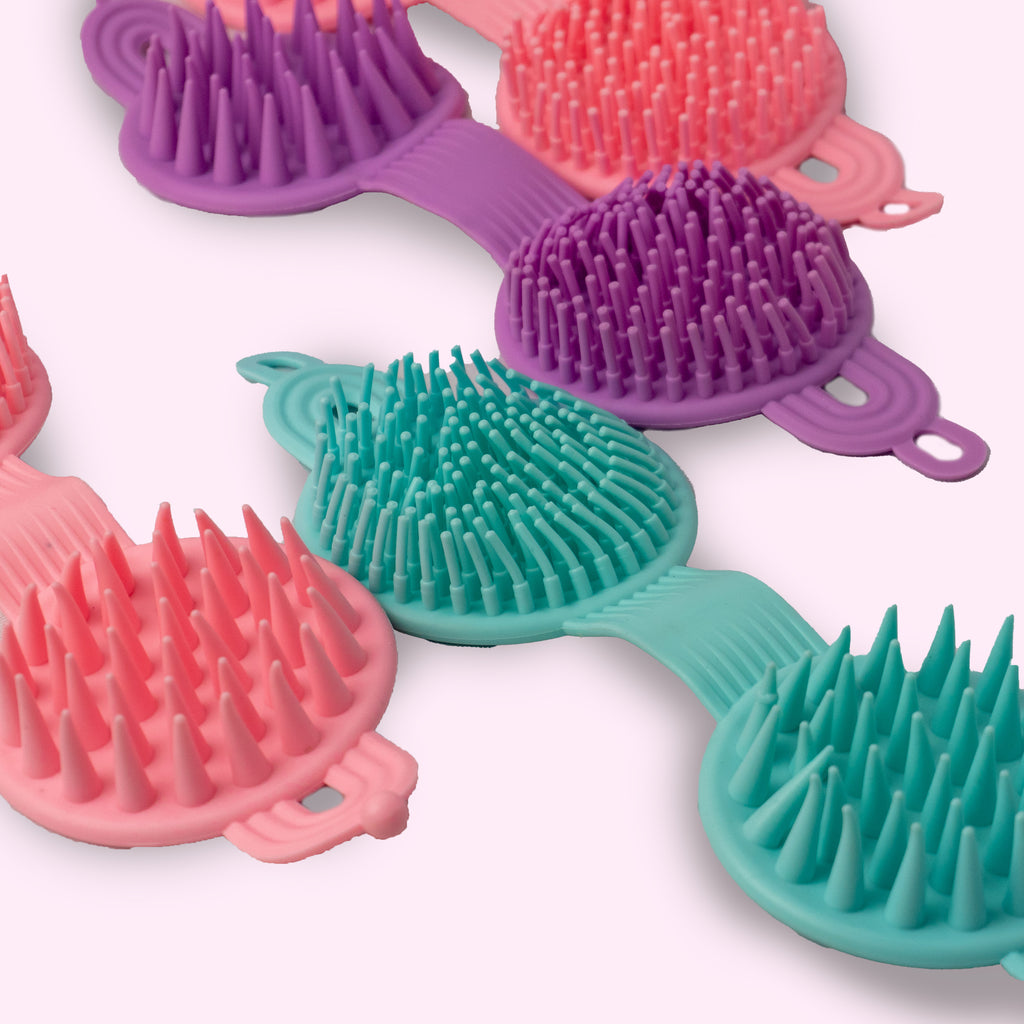 Cepillo masajeador capilar